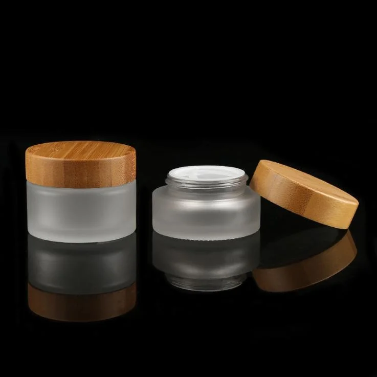 Hot Sale Cosmetic Face Cream Container 5ml 15ml 30ml 50ml 100ml Frosted Clear Glass Cream Jar with Bamboo Wood Cover